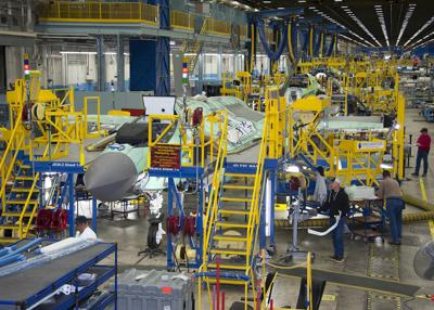 Lockheed Martin employees work on the F-35 Lightning II Joint Strike Fighter production line