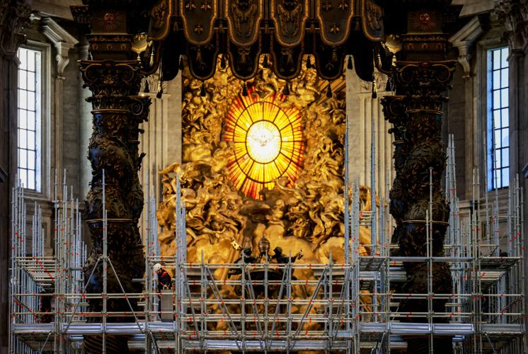 A view of scaffolding around a baroque sculpted bronze canopy by Gian Lorenzo Bernini over the high altar of St. Peter's Basilica in preparation for its restoration, at the Vatican